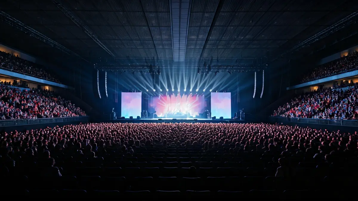 Imatge d'un espai cultural modern i multifuncional amb il·luminació dinàmica.