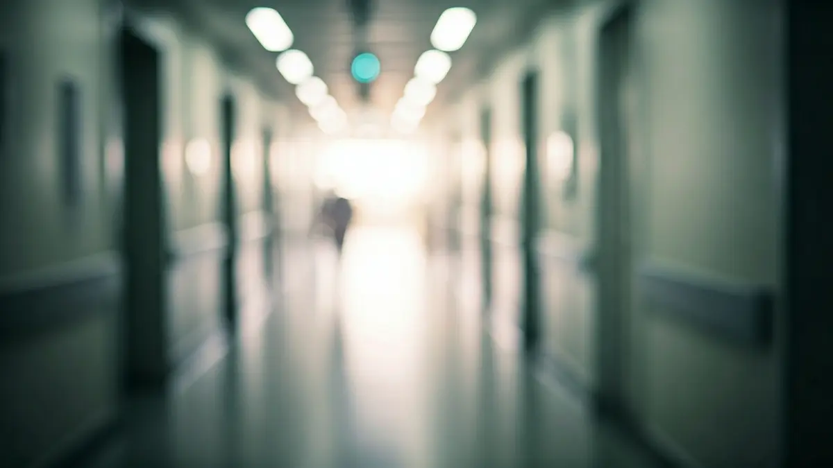 Generic image of a modern, brightly lit hospital corridor.