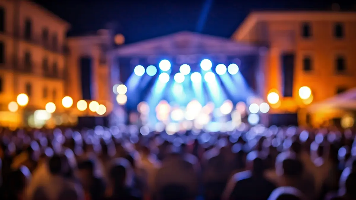 Generic image of an outdoor night concert in a Mediterranean city.