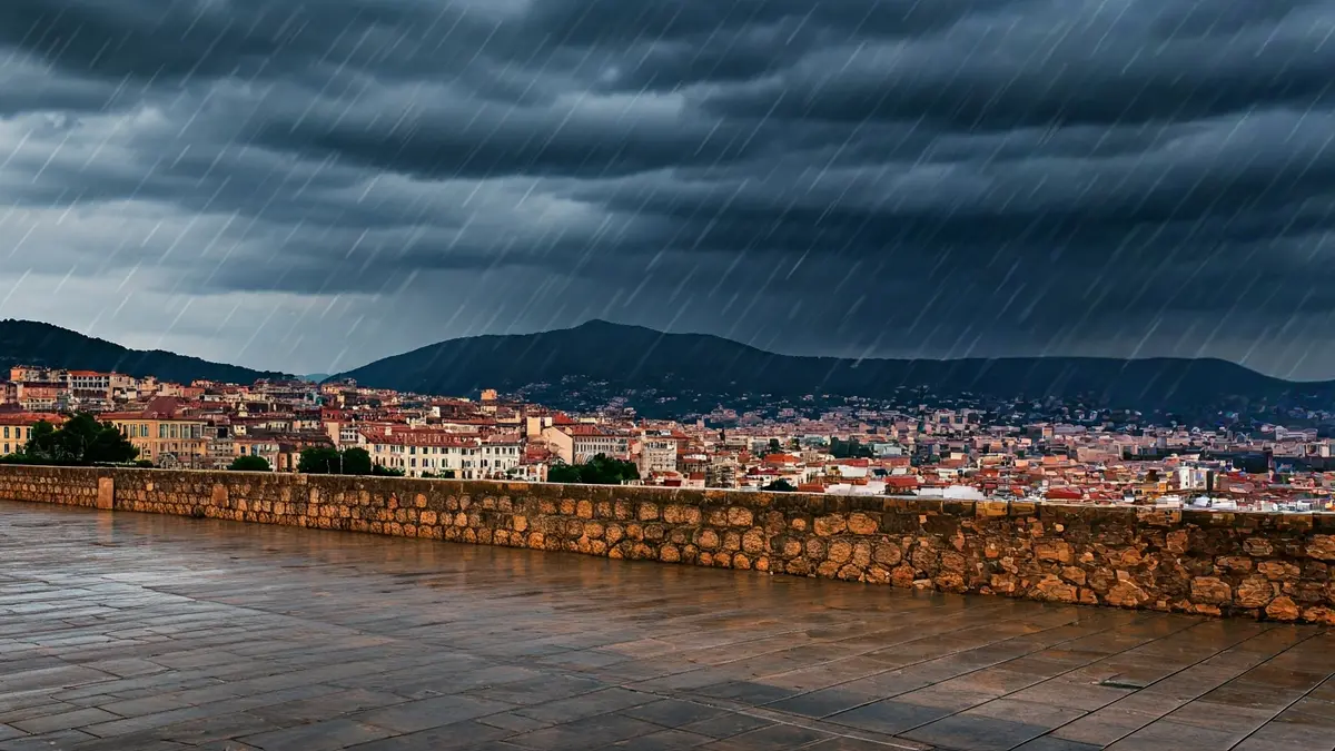 Imatge genèrica d'un dia plujós amb un paraigua obert.