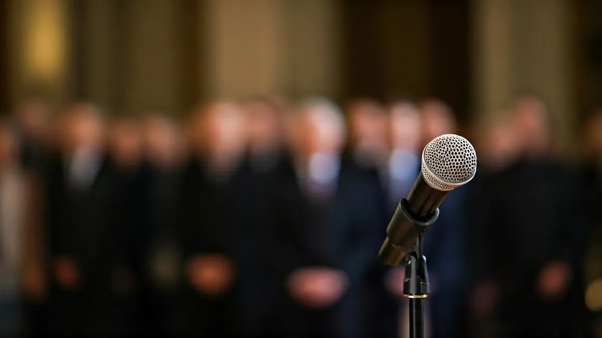 Generic image of a microphone on a podium, symbolizing a memorial and reflection event.
