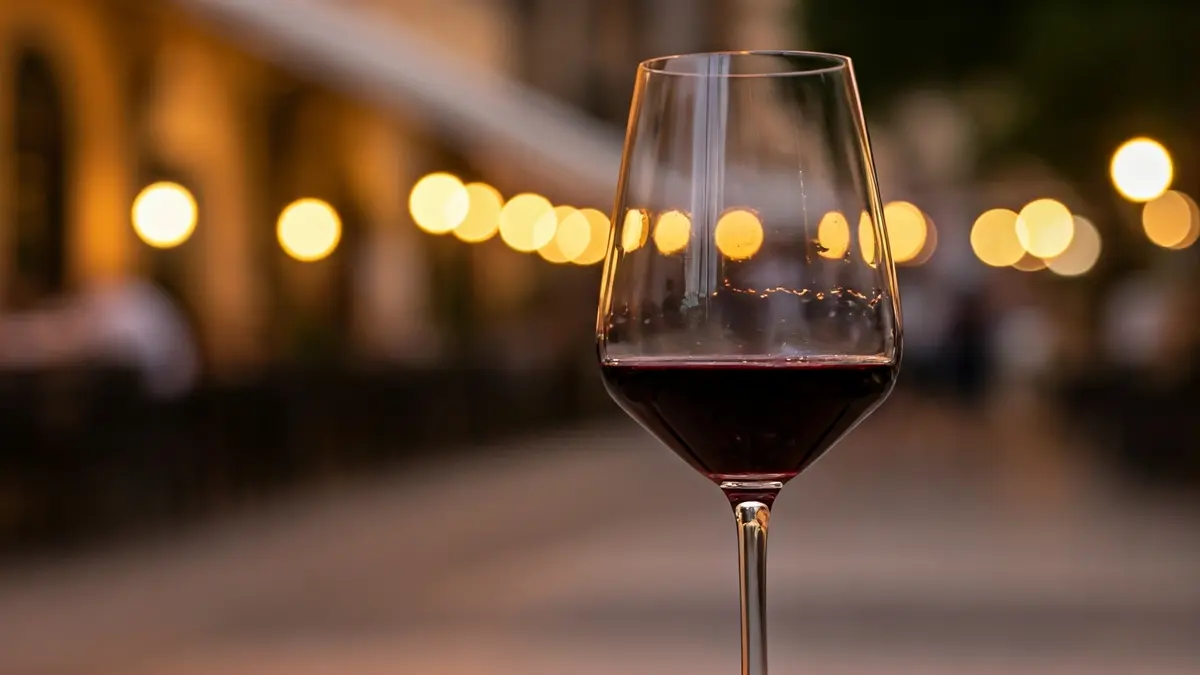 Generic image of a wine glass in an urban setting.