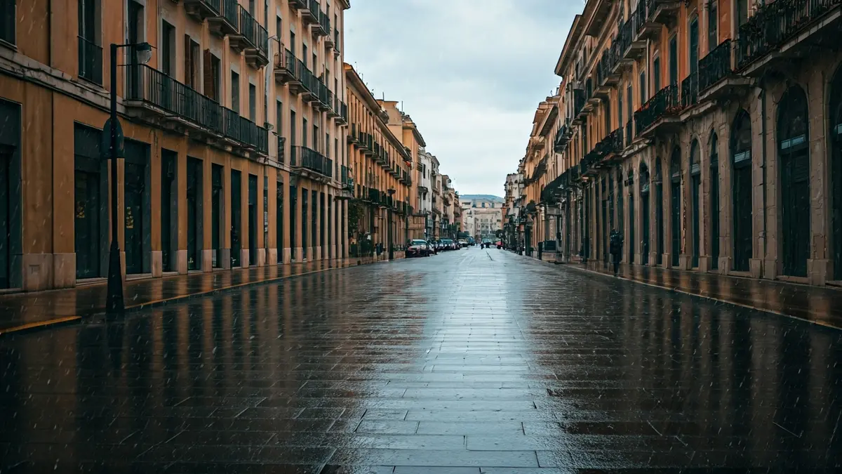 Generic image of a city street with light rain and overcast sky.