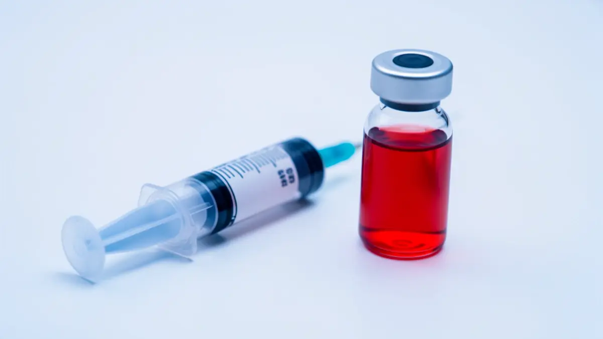 Generic image of a medical syringe and a vial.