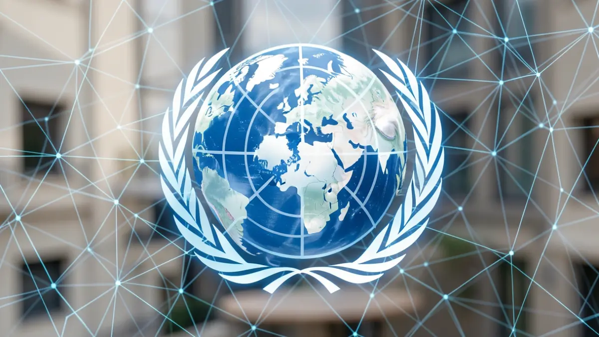 United Nations logo and Earth with digital patterns, symbolizing AI governance.