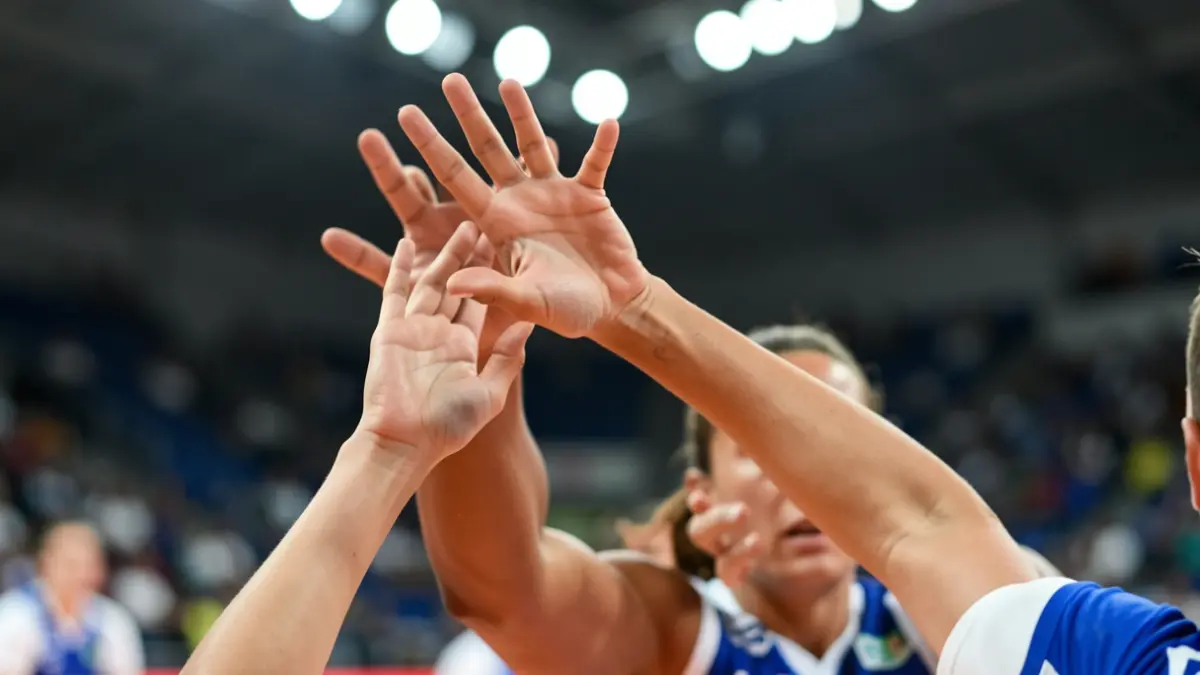 Generic image of a volleyball player in a defensive stance.