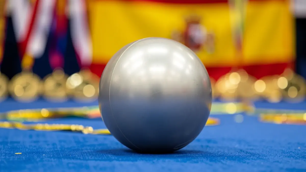 Generic image of medals and a rhythmic gymnastics ball.